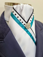 Load image into Gallery viewer, ERA SOPHIE STOCK TIE - White Satin with Black satin piping, turquoise trim, black crystals &amp; silver brooch
