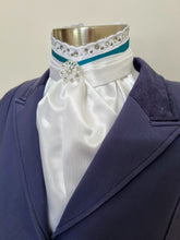 Load image into Gallery viewer, ERA EURO BELLE with CRYSTALS Stock Tie - White lustre satin with Teal trim, lace frill, crystal trim and brooch

